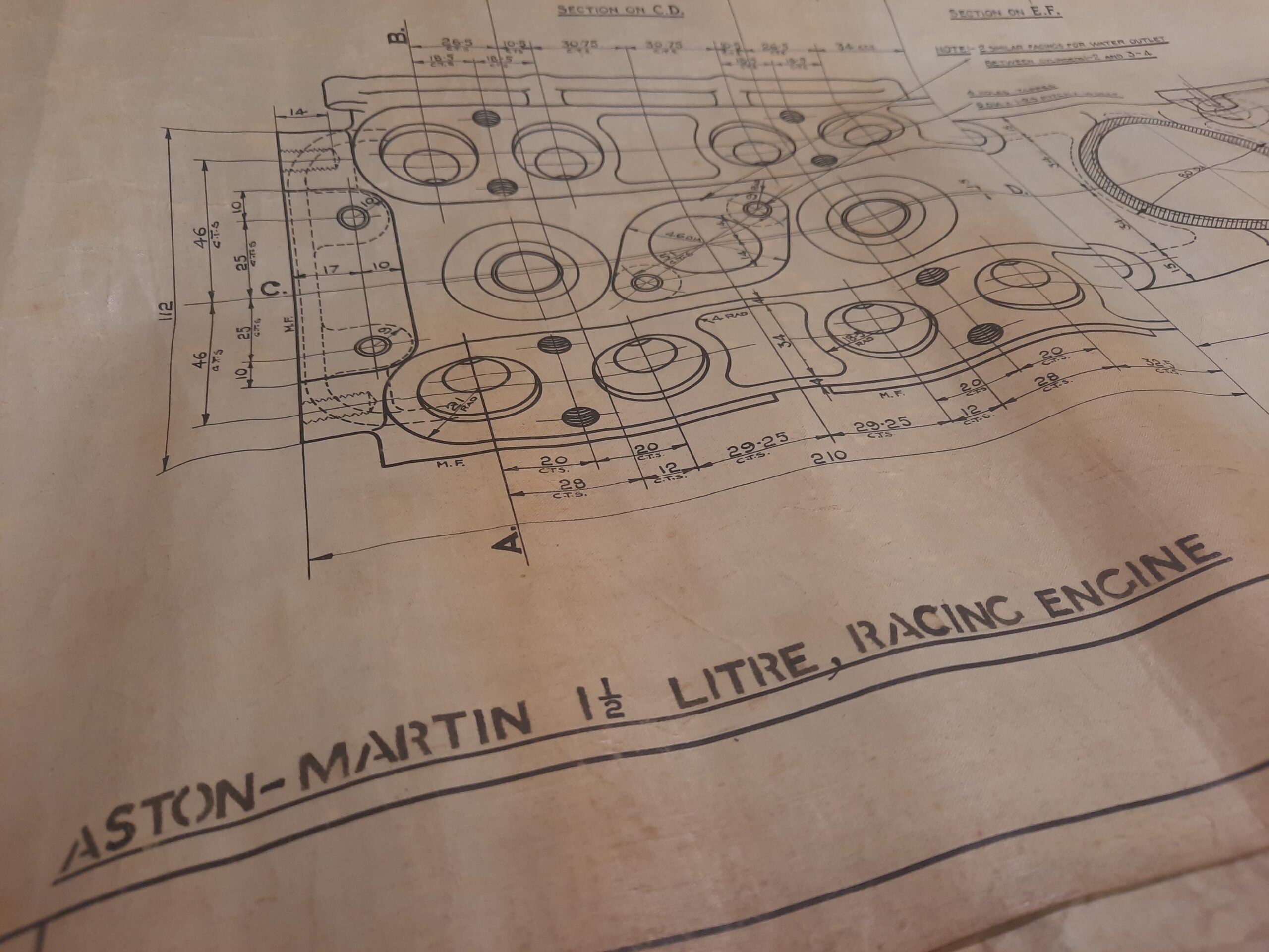 Zoomed in image of an engineering drawing showing 'Aston-Martin 1 1/2 litre, racing engine'