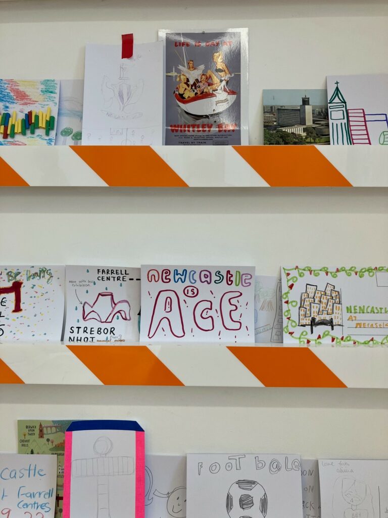 'Newcastle is Ace', the image shows children's drawings of architecture and scenes of Newcastle