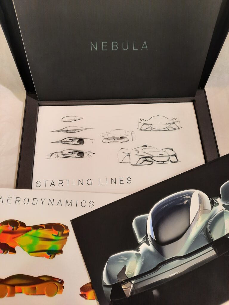 The Nebula Collaboration Presentation Box with drawings from within the box arranged on top of it