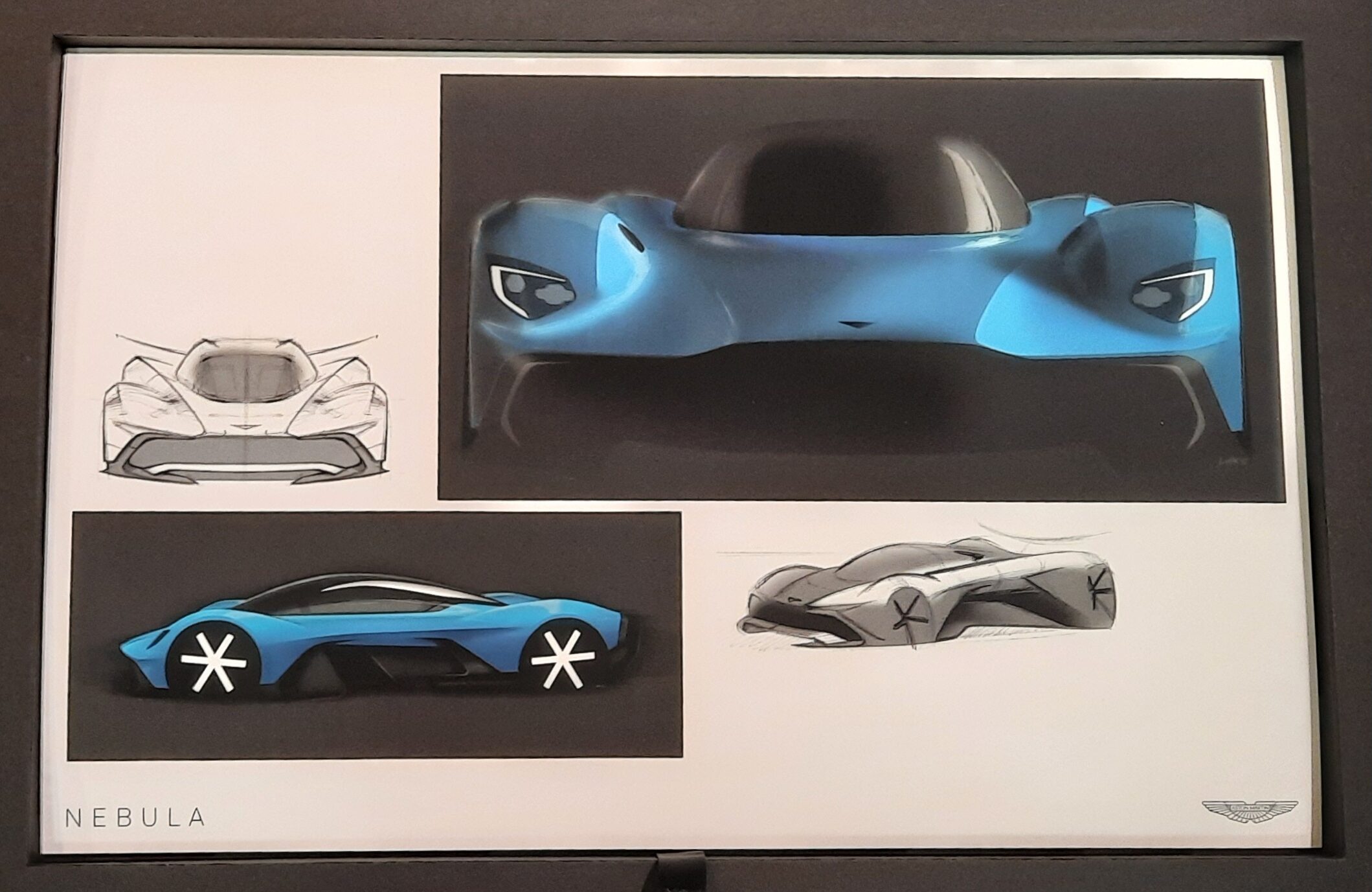 A card from the Nebula Collaboration Presentation Box showing drawings for the car from different angles, some with blue bodywork