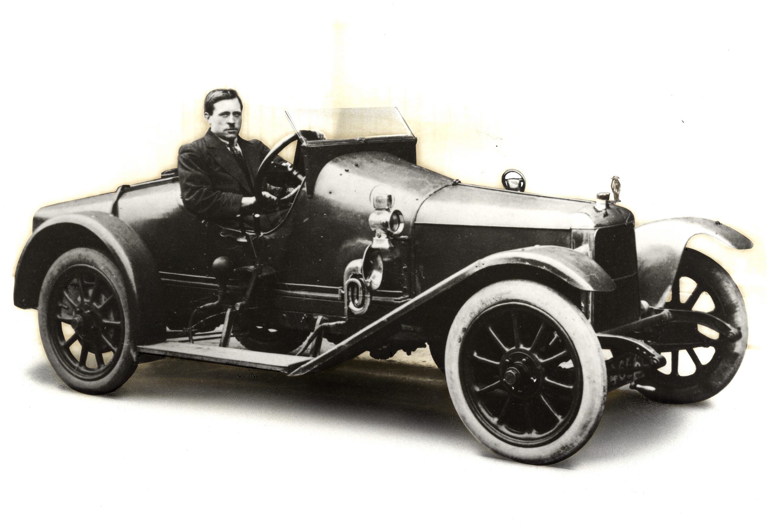 Image of Jack Addis at the wheel of ‘Coal Shuttle’ circa 1919.